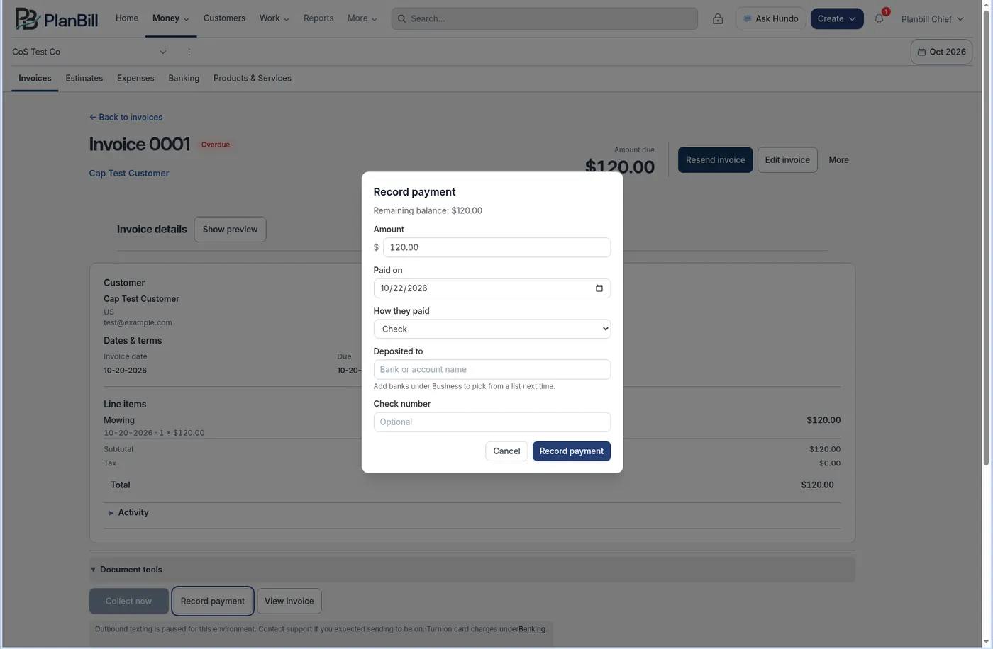 The Record payment dialog on an invoice, with the amount, the Paid on date, Check picked under How they paid, Deposited to, and Check number.